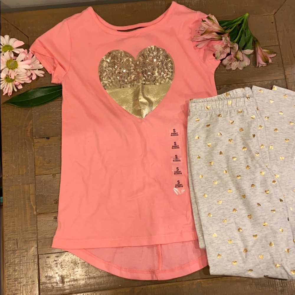 Pink short sleeve shirt with gray pants hearts